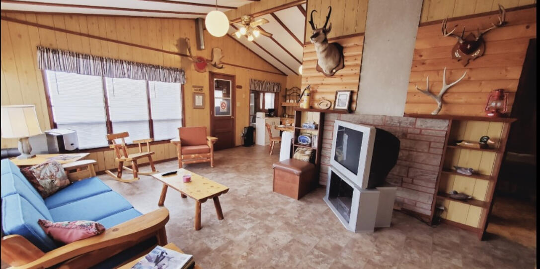 Timbered Log Walls, High Ceilings Highland Cabin